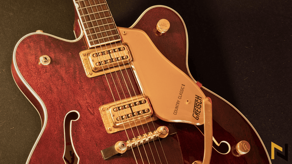 Displays Gretsch Hollowbody Electric Guitar