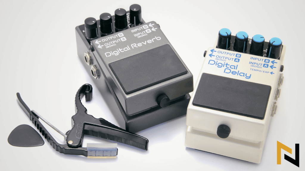 image shows some of our best gifts for guitar players including looper pedals, capos and picks